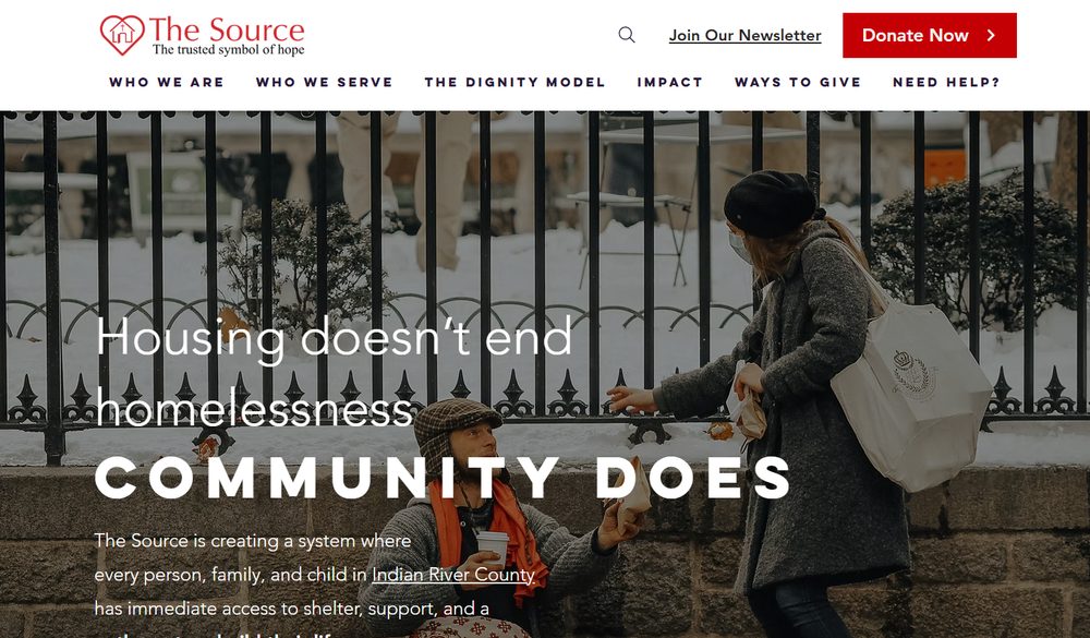The Source homepage — hero headline 'Housing doesn't end homelessness, community does' with donation and help links